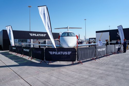 Pilatus chalet with a plane outside the front
