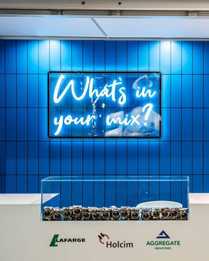 LafarageHolcim exhibition stand writing on wall