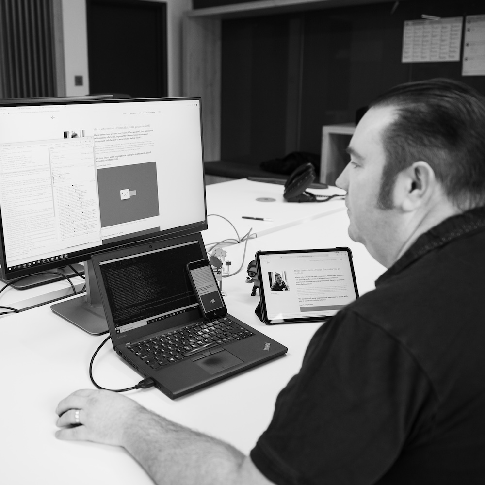 Anton at laptop - Development of virtual events in action